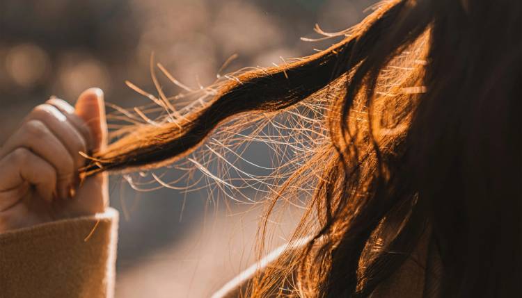 Woman playing with her hair