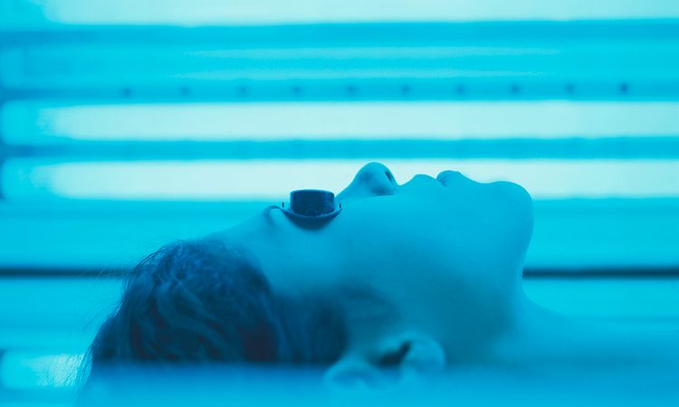 Woman on Tanning Bed
