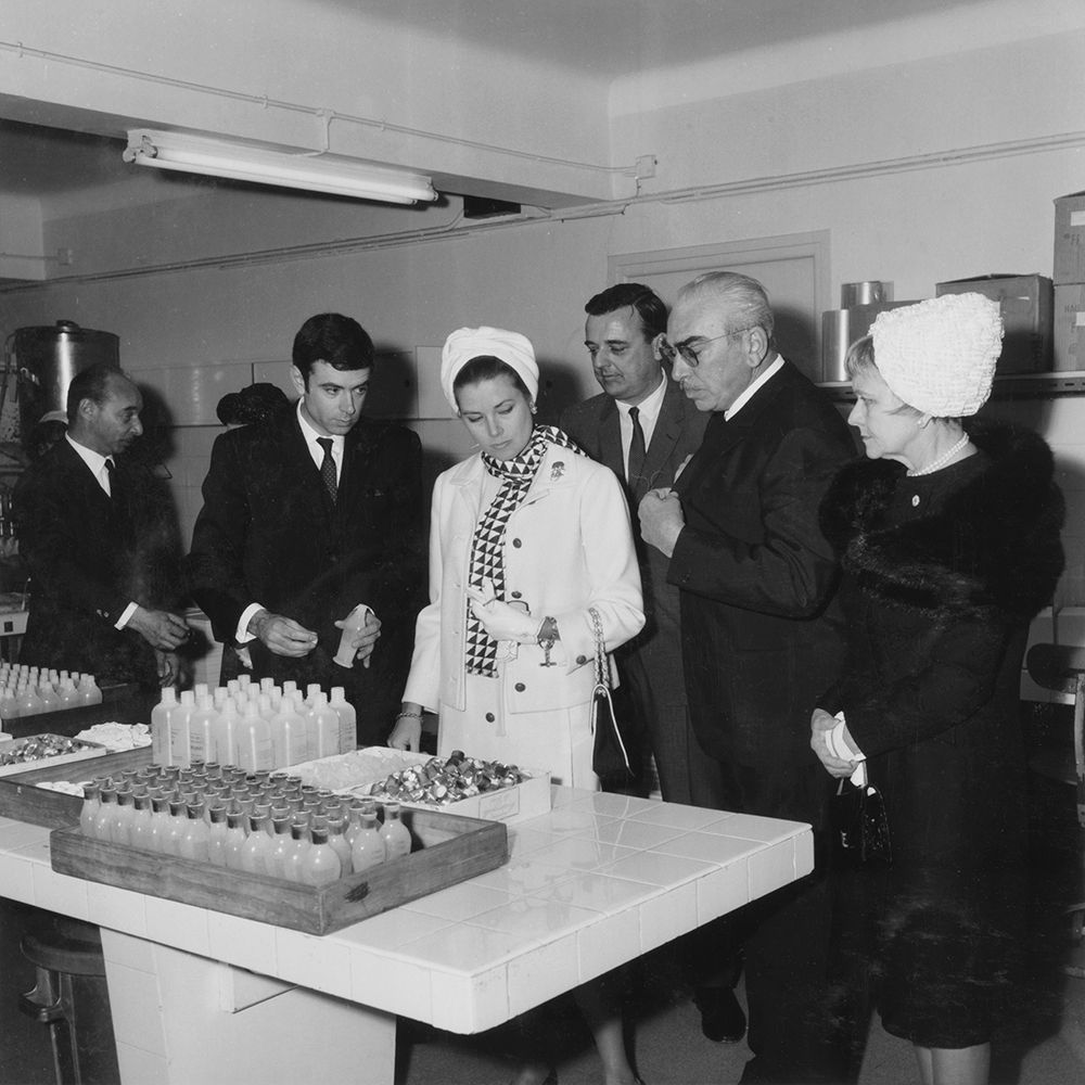 Princess Grace Kelly touring a Lancaster factory