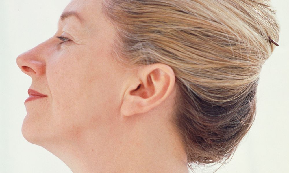 Naked mature woman, profile, close-up, portrait