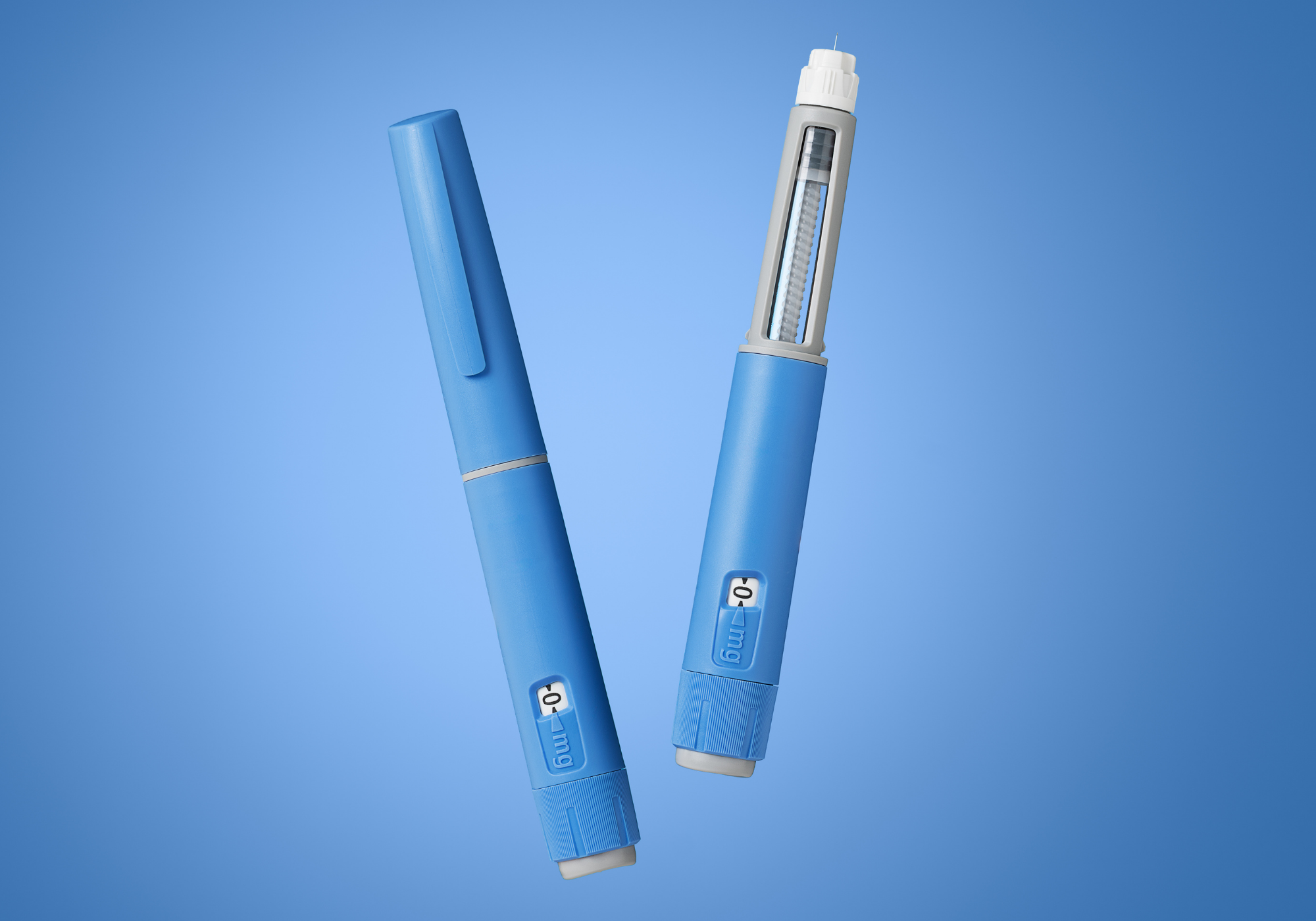Two blue semaglutide injection pens shown against a blue background
