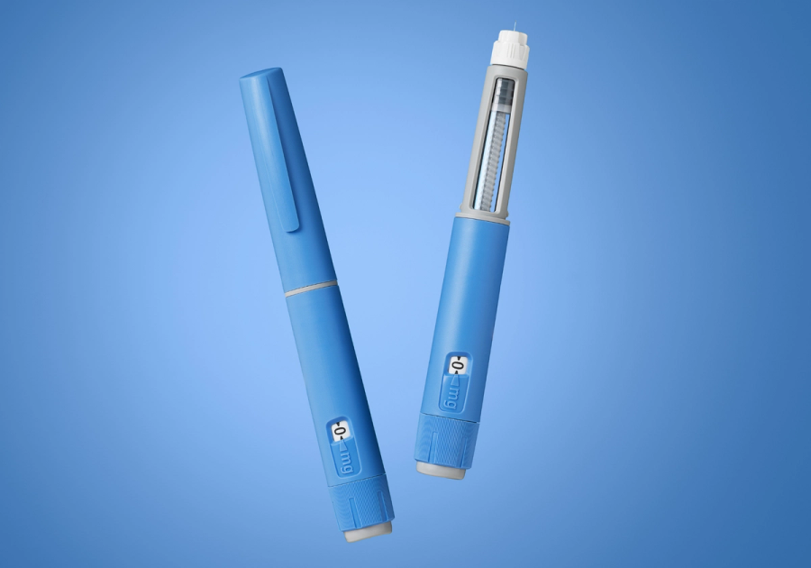 Two blue semaglutide injection pens shown against a blue background