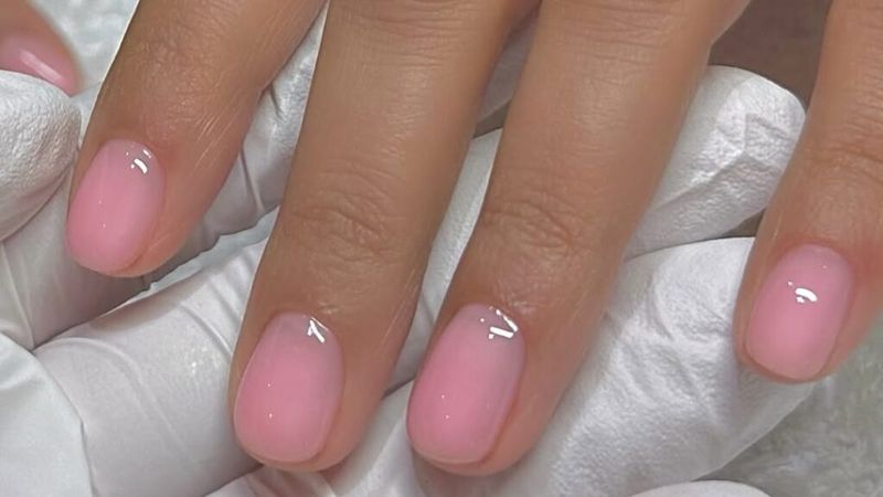 Short nails with rosy pink polish