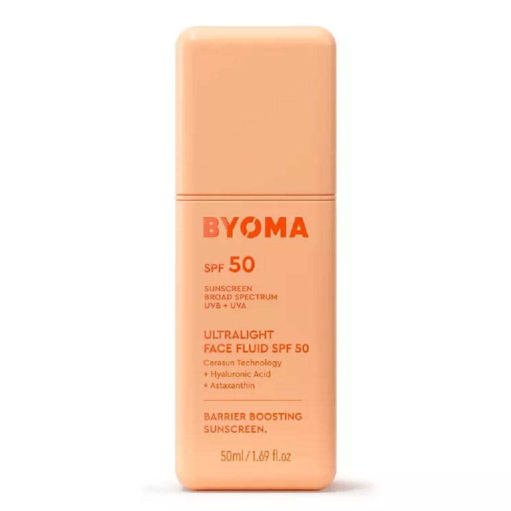 BYOMA Ultralight Face Fluid SPF 50 in a peach-toned rectangular bottle, labeled broad-spectrum UVB + UVA sunscreen with barrier-boosting ingredients