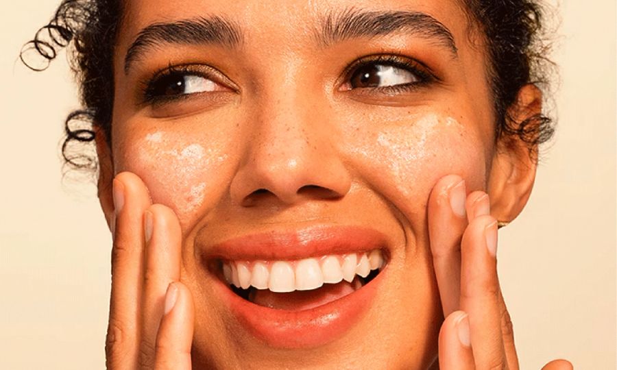 woman washing face