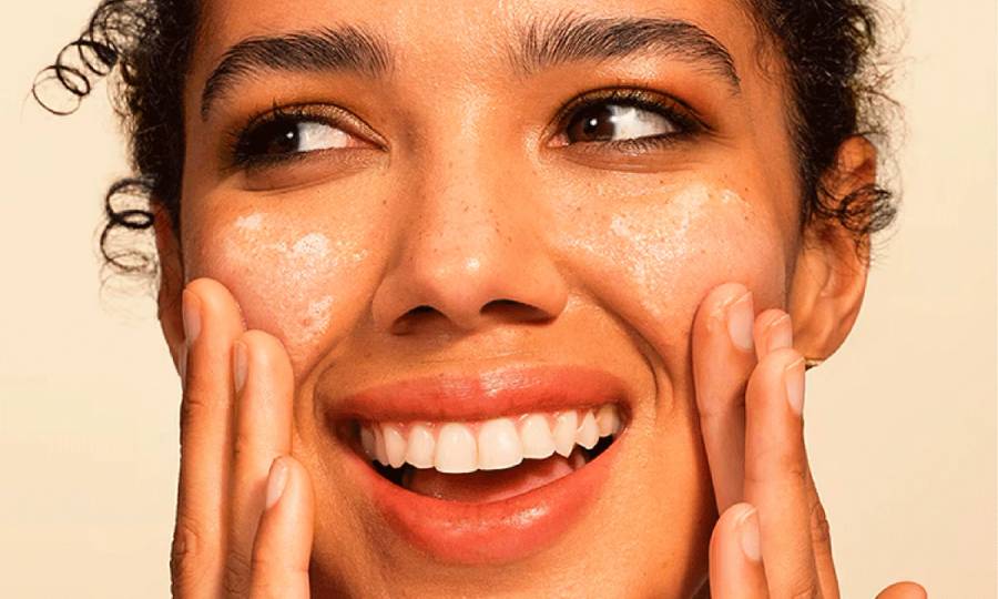 woman washing face