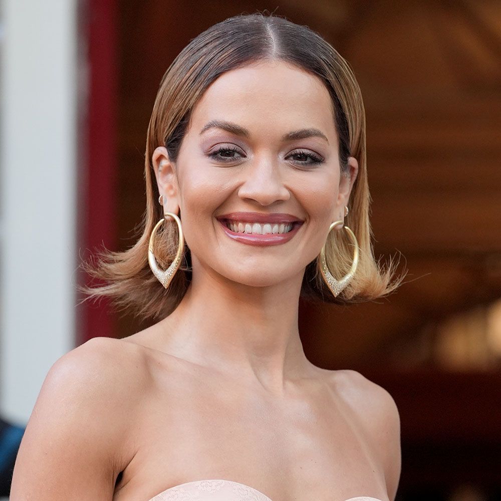 Rita Ora with a flipped up short hairstyle 