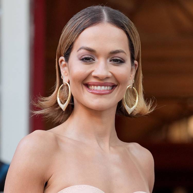 Rita Ora with a flipped up short hairstyle 