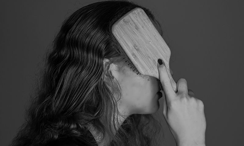 woman brushing hair