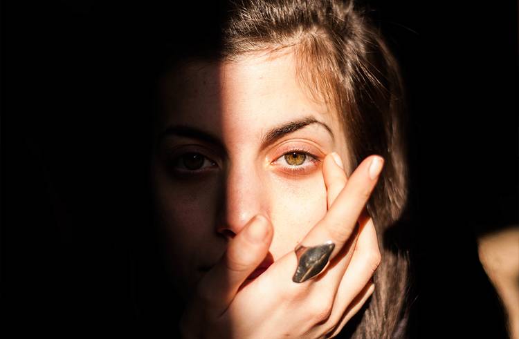 Consider using an orange color corrector under your usual concealer