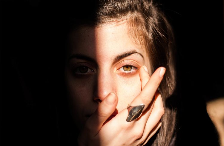 Consider using an orange color corrector under your usual concealer