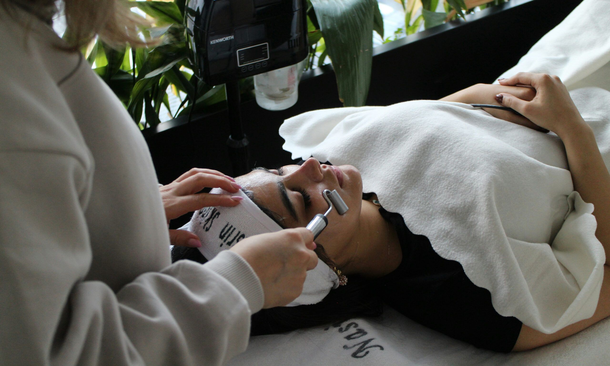woman laying down getting a skin treatment