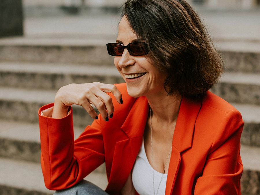 mature woman in red blazer