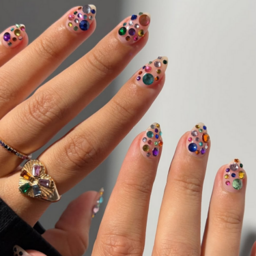 Short nails with colorful gemstones