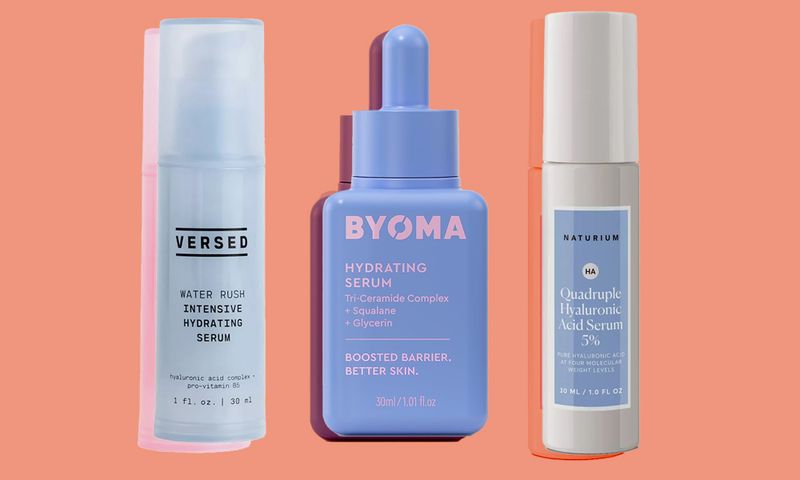 various hydrating serums on an orange background