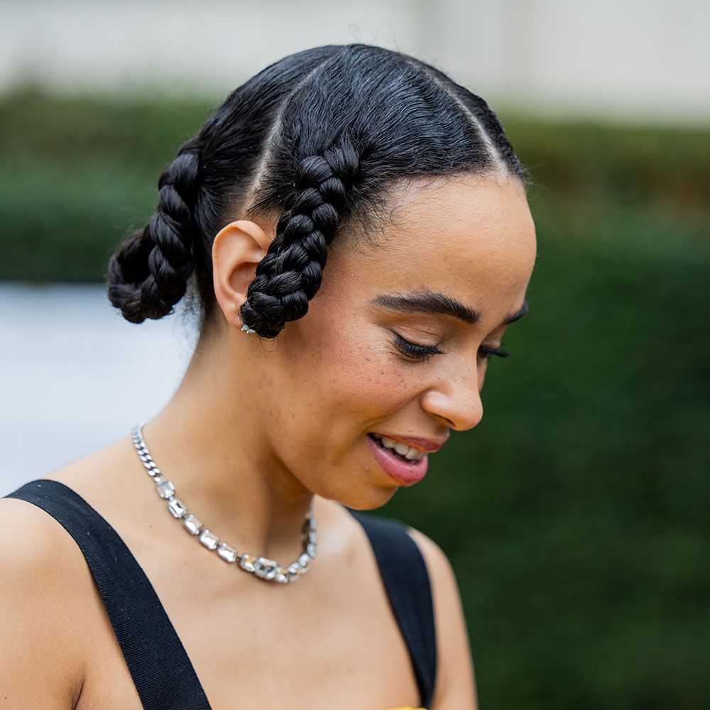 Woman with dutch braids hairstyle