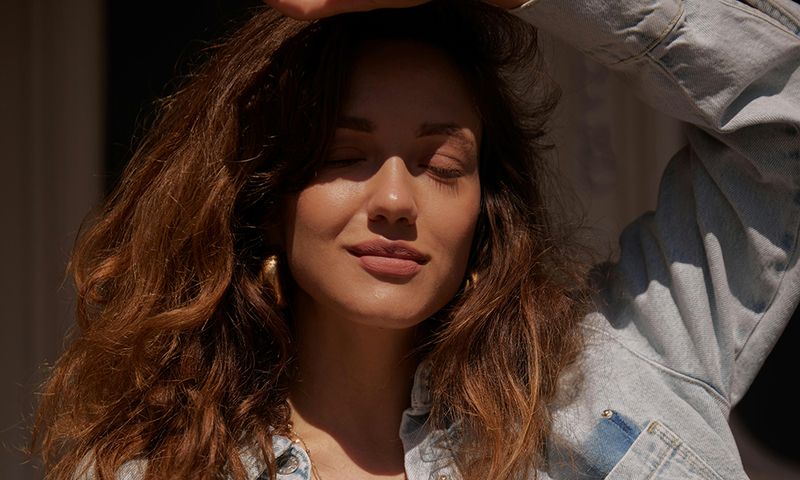 woman with soft makeup in sunshine