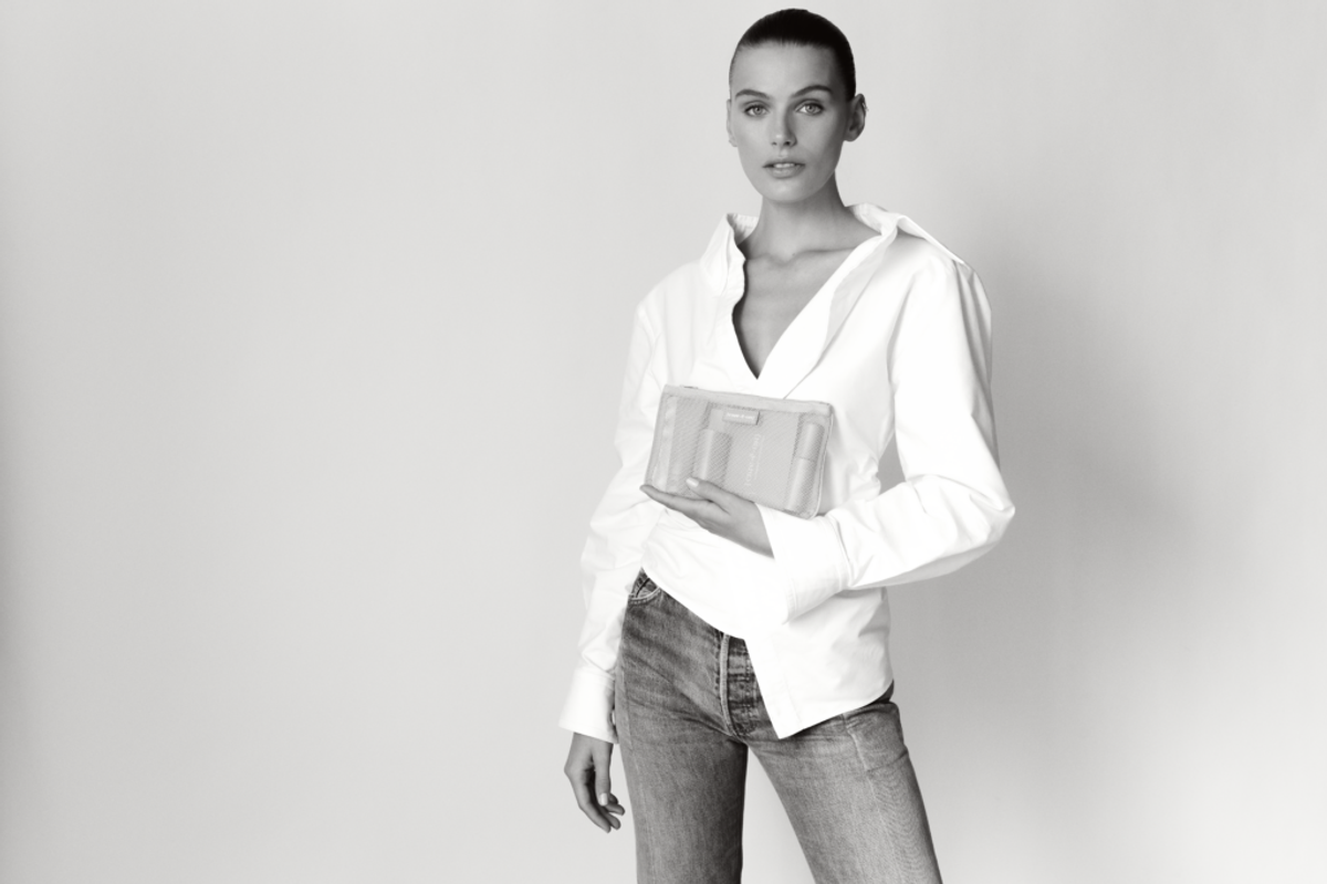 Model Madison Headrick holding the Care.ē.on Collection