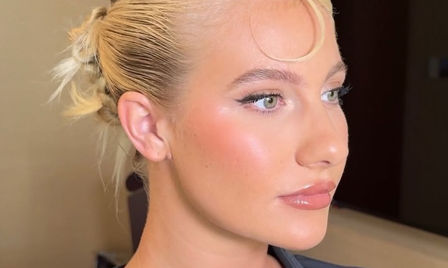 woman wearing face full of makeup