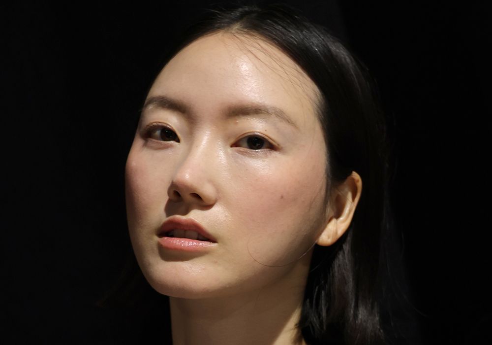 NEW YORK, NEW YORK - SEPTEMBER 14: A model prepares backstage for the Bach Mai Fashion Show during September 2025 New York Fashion Week on September 14, 2025 in New York City.