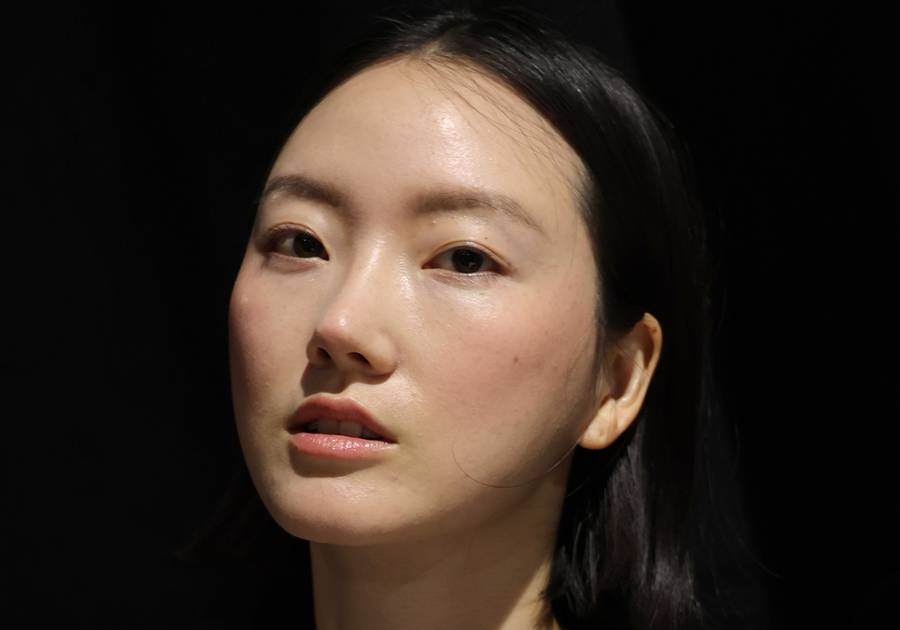 NEW YORK, NEW YORK - SEPTEMBER 14: A model prepares backstage for the Bach Mai Fashion Show during September 2025 New York Fashion Week on September 14, 2025 in New York City.