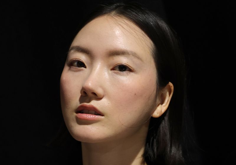 NEW YORK, NEW YORK - SEPTEMBER 14: A model prepares backstage for the Bach Mai Fashion Show during September 2025 New York Fashion Week on September 14, 2025 in New York City.