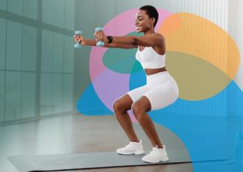 woman doing exercises with weights on a yoga mat