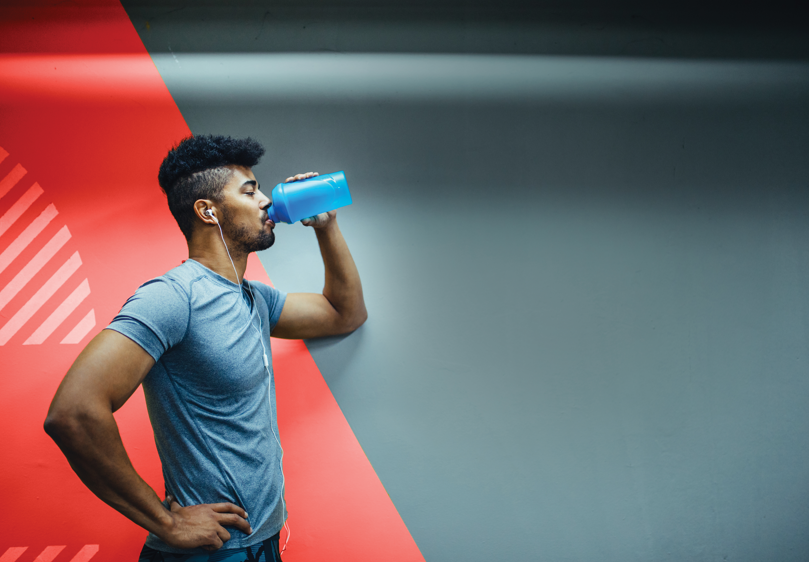 man drinking sports beverage
