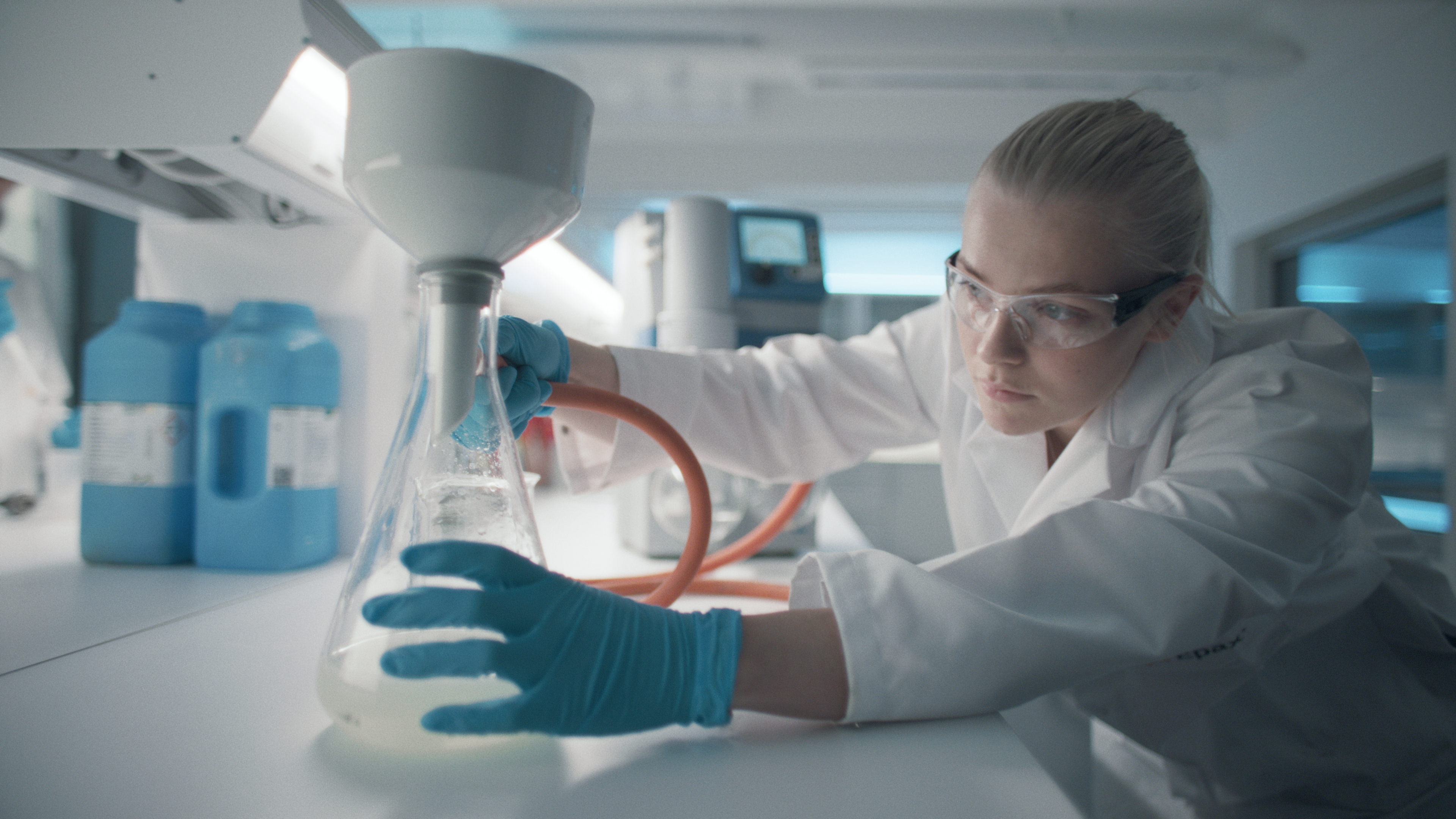 scientist with beaker