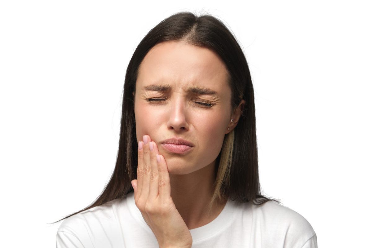 woman holding cheek in pain