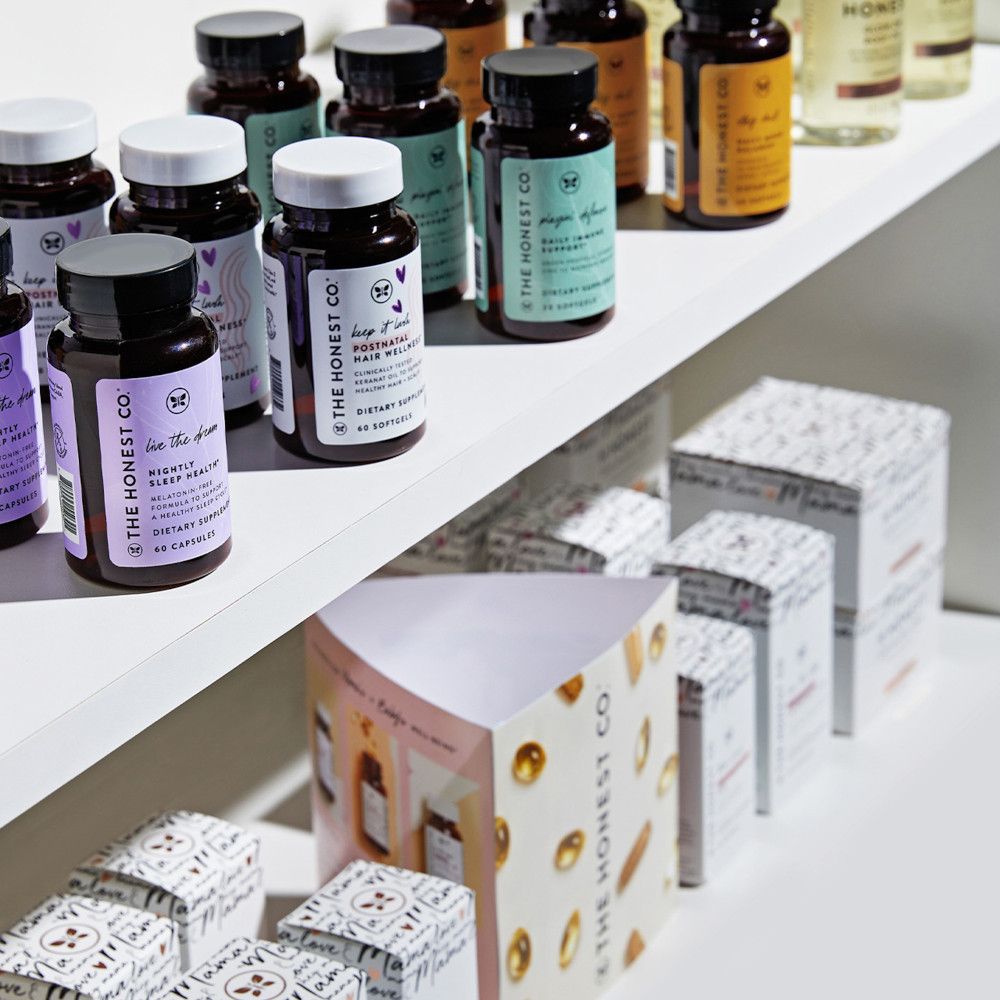 The Honest Co. supplement bottles on a store shelf