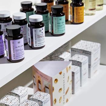 The Honest Co. supplement bottles on a store shelf