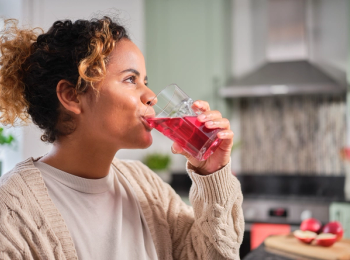 woman drinking fortified beverage