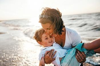 mother and son on the beach