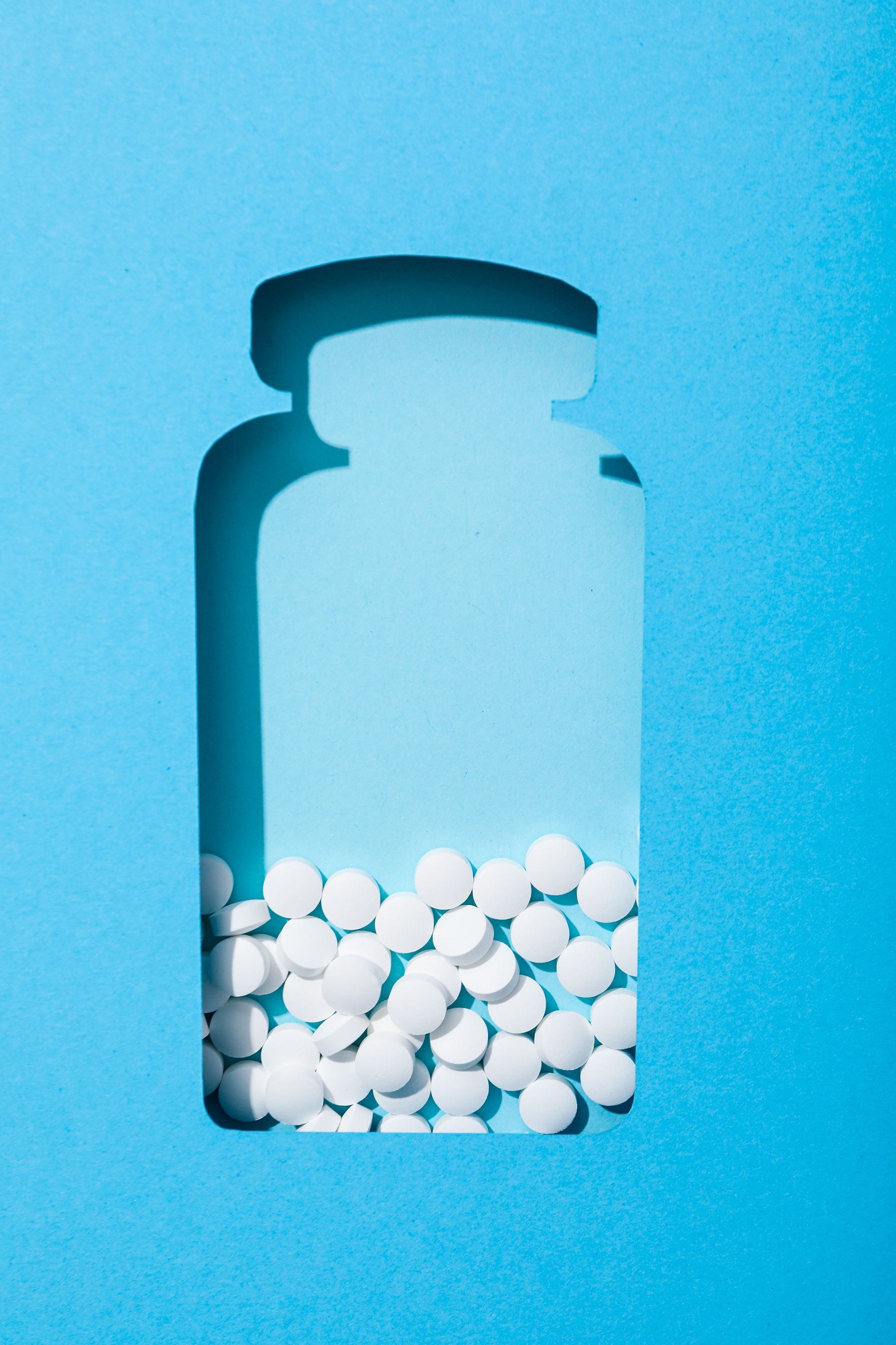 illustration of pills in a bottle