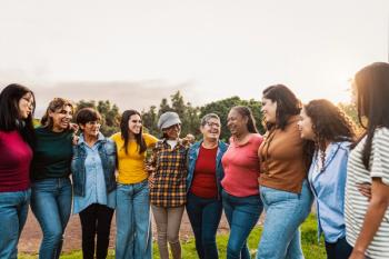 multiple generations of women standing together