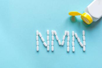 tablets in the shape of NMN on blue background