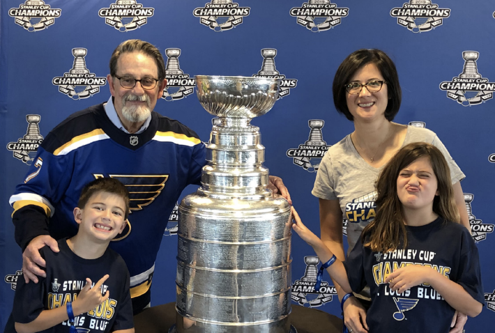 The DiPersio family with the Stanley Cup following the St Louis Blues’ first NHL championship in 2019, from left: John, Jack, Allison King MD, PhD, MPH, and Isabella.