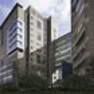 Merging Community Practices With an Academic Cancer Center