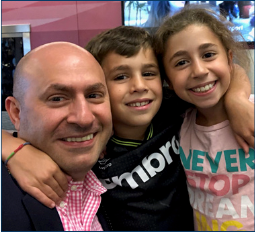 Choueiri with his children, Sam, center, and Zeina.