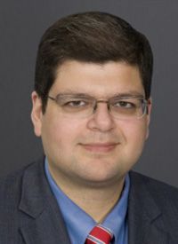 Cyrus M. Khan, MD