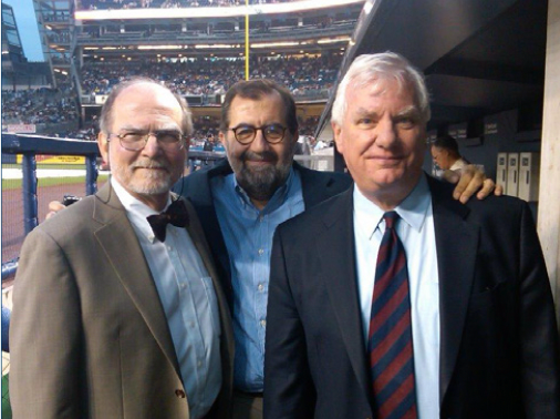 O’Reilly visits the New York Yankees’ dugout with MSK colleagues Paul A. Meyers, MD, left, and Farid Boulad, MD.