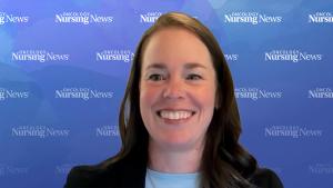 Image of a woman with brown hair wearing a blazer in front of an Oncology Nursing News backdrop