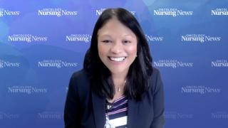 Image of a woman with dark hair wearing a blazer in front of a watercolor Oncology Nursing News background