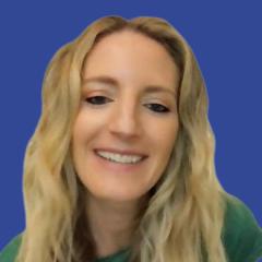 Photo of a woman with blond wavy hair in front of a dark blue background