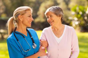 Smiling Nurse and Patient