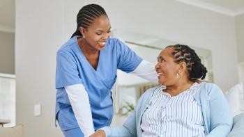 Photo of a nurse talking to a patient