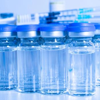 Image of a row of vials lined up on a counter