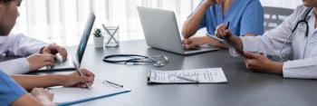 Doctor and nurse in medical meeting discussing strategic medical treatment plan together with report and laptop. Medical school workshop training concept in panoramic banner. Neoteric: © Summit Art Creations - stock.adobe.com