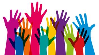 diverse hands being raised
